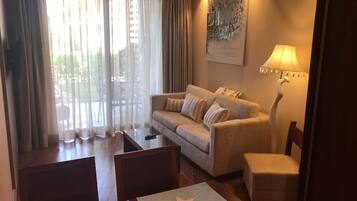 Apartment | Desk, laptop workspace, blackout curtains, iron/ironing board
