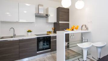 Apartment, 2 Bedrooms | Private kitchen | Fridge, microwave, stovetop, electric kettle