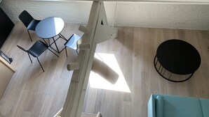 Duplex Suite | Living room | Flat-screen TV - The Mansion (Ghent)