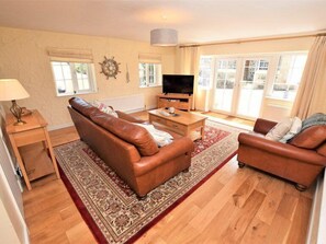 Chaumière | Aire de séjour | Téléviseur à écran plat