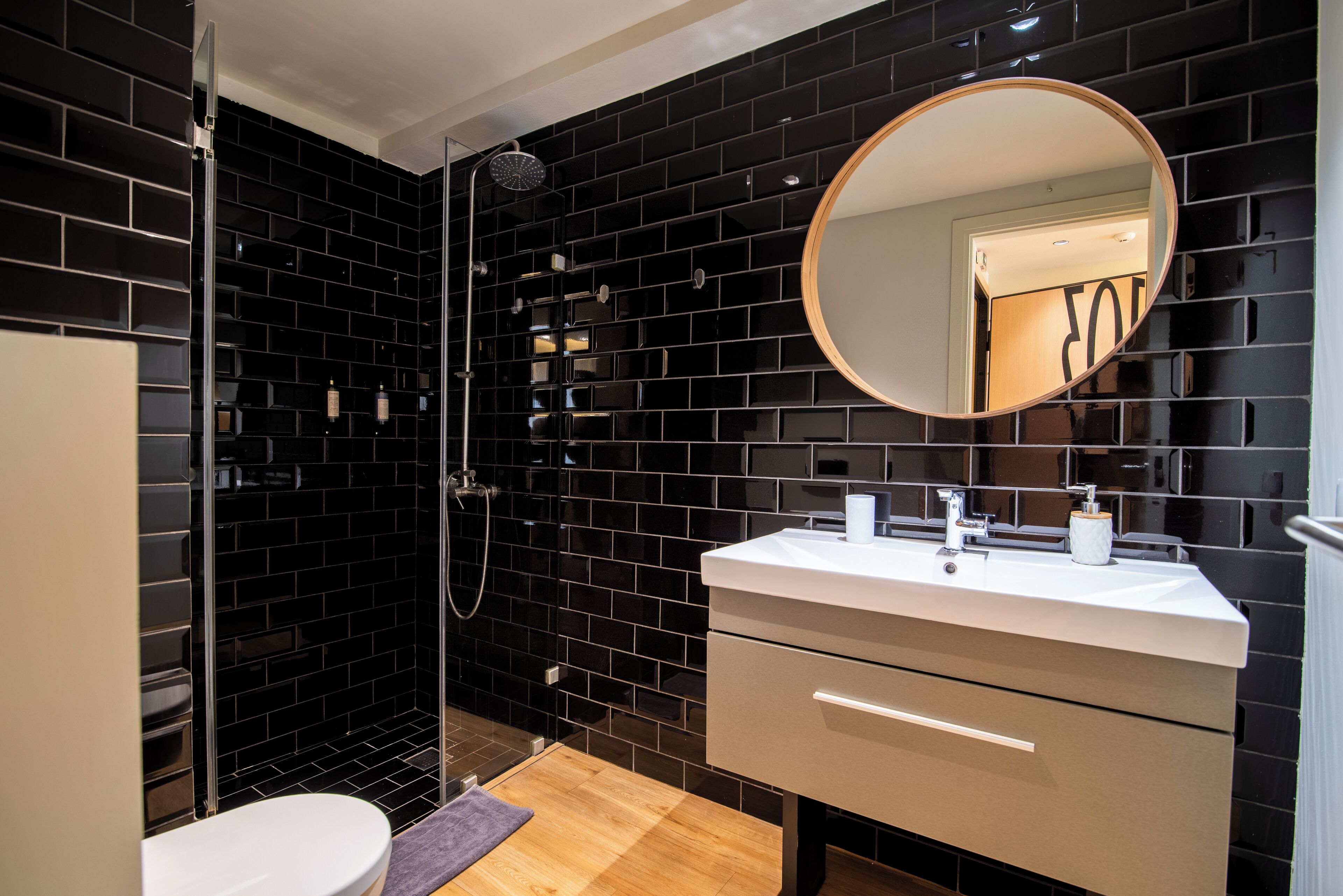 superior quadruple room | bathroom | shower, rainfall showerhead, hair dryer, slippers