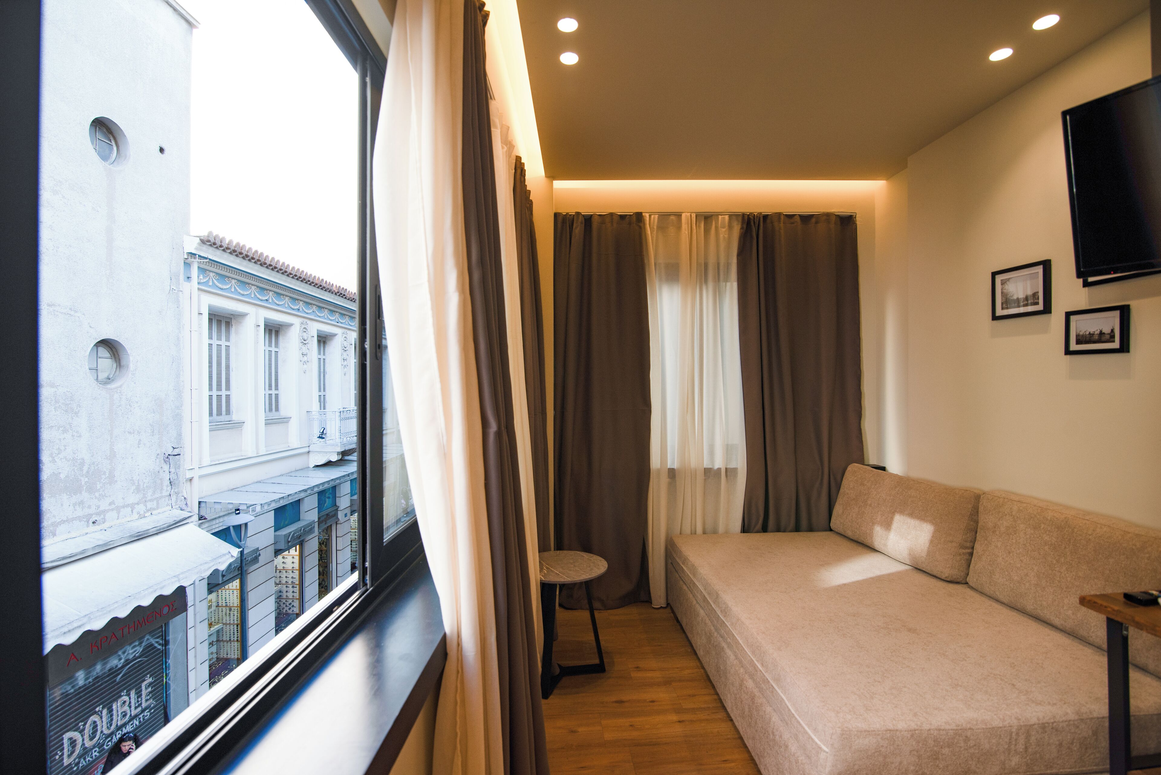 superior quadruple room | desk, laptop workspace, blackout curtains, soundproofing