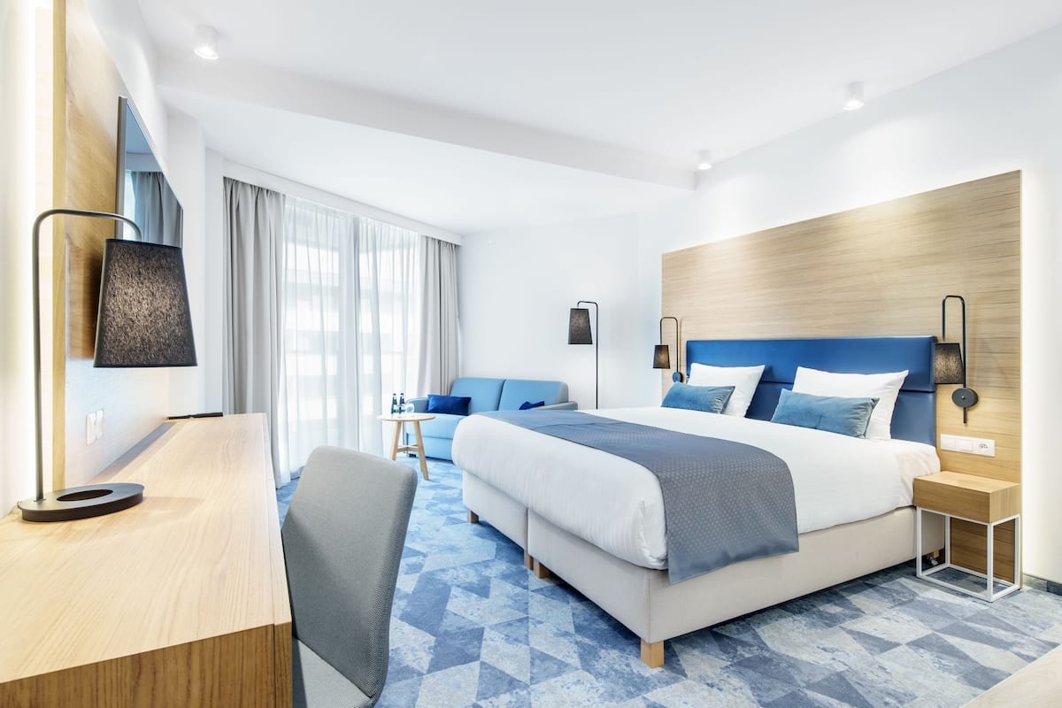 Deluxe Double Room | Desk, blackout drapes, soundproofing, iron/ironing board