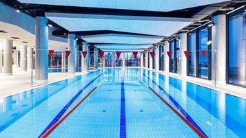 Indoor pool, open 10:00 AM to 10:00 PM, pool loungers