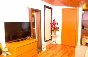 Departamento, 1 habitación | Área de sala de estar