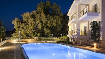 Outdoor pool, pool umbrellas, pool loungers
