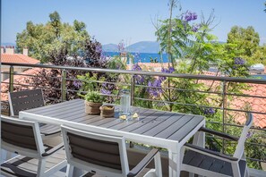 Junior-Suite, 1 Schlafzimmer, Gartenblick (Tangerine) | Balkon