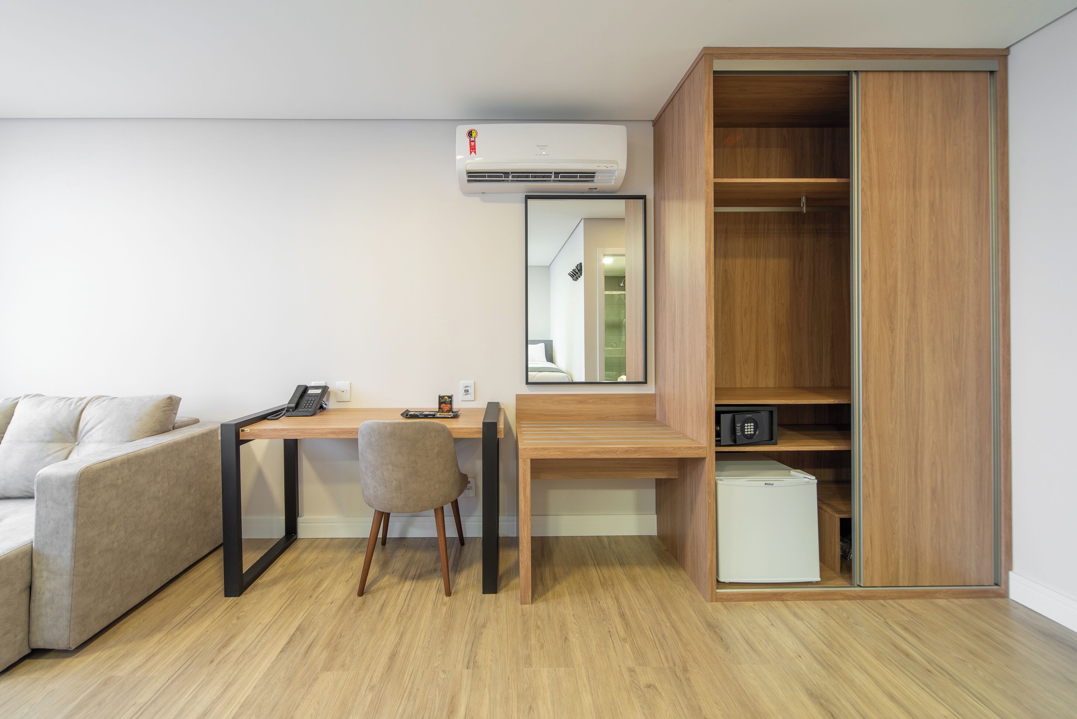 deluxe triple room | in-room safe, desk, laptop workspace, blackout curtains