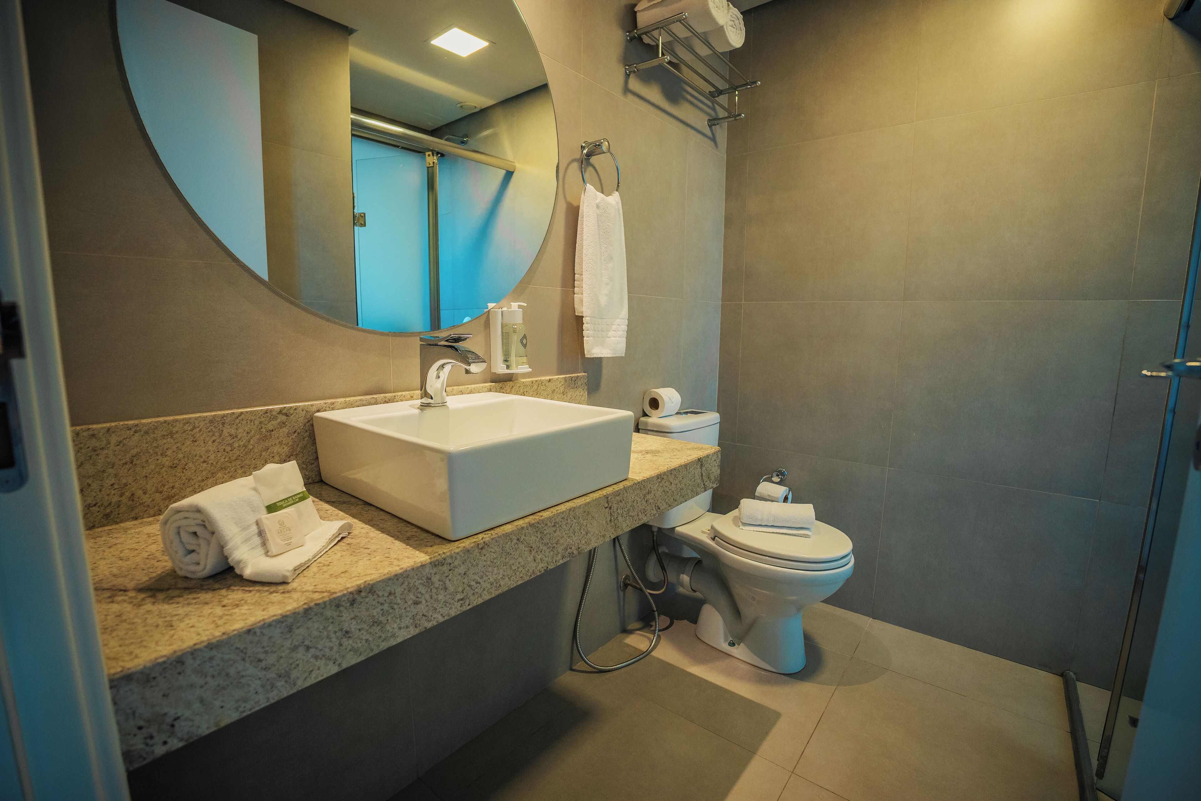deluxe double room | bathroom | shower, hair dryer, towels, soap
