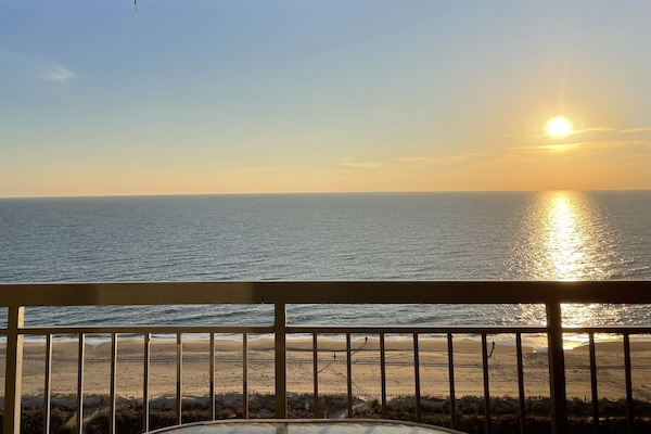 Enjoy beautiful Sunrises from the large balcony overlooking the ocean