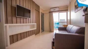 Apartment | Living area | 20-inch plasma TV with cable channels, TV