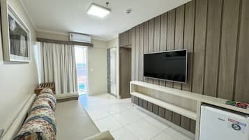 Apartment | Living area | 20-inch plasma TV with cable channels, TV