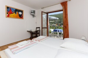 Tweepersoonskamer, uitzicht op zee | Luxe beddengoed, gratis wifi, beddengoed