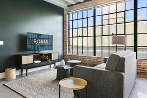 Adjacent Five Bed Four Bath Apartment | Living area | 42-inch flat-screen TV with cable channels, TV