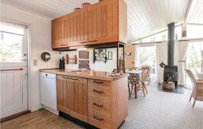 Fridge, stovetop, dishwasher, coffee/tea maker