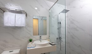 Shower, free toiletries, hair dryer, slippers
