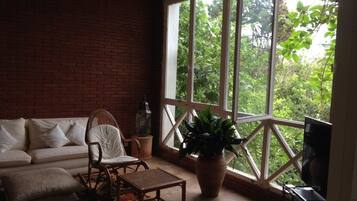 Deluxe Villa, 3 Bedrooms | Living area | Plasma TV