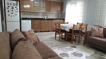 Apartment, 3 Bedrooms | Private kitchenette | Full-size fridge, microwave, oven, stovetop