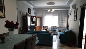 Apartamento, 3 habitaciones | Zona de estar