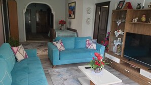 Apartamento, 3 habitaciones | Zona de estar