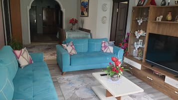 Apartment, 3 Bedrooms | Living area | LCD TV