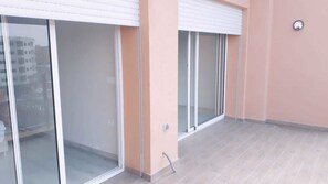 Apartamento conforto, 1 quarto | Terraço/pátio
