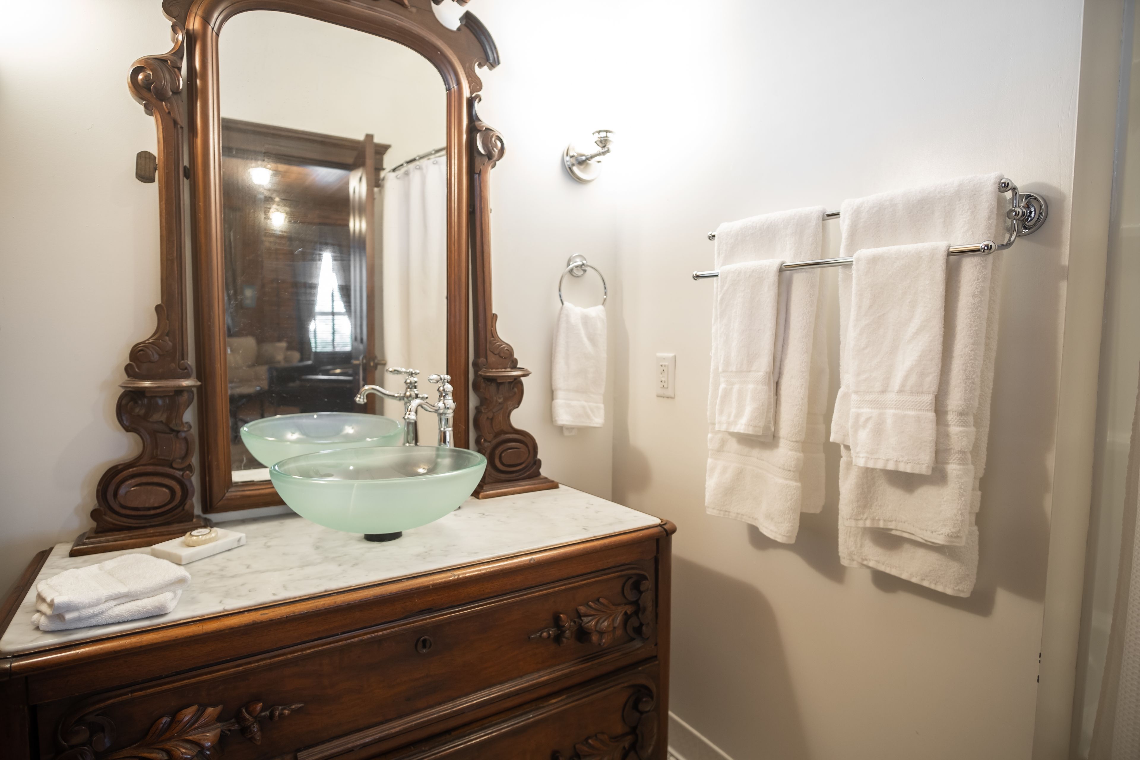 the riley suite | bathroom | combined shower/bathtub, hair dryer, towels, soap