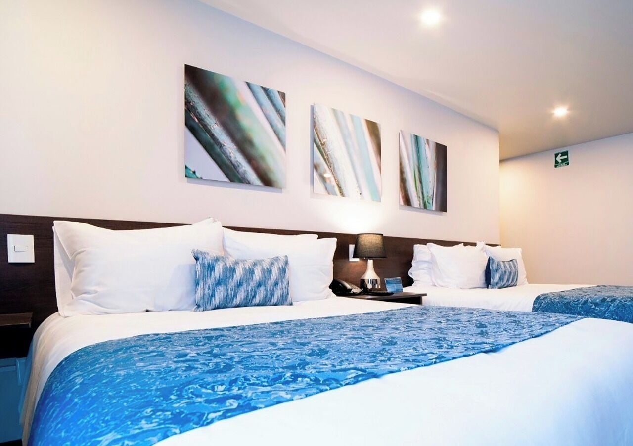 deluxe studio suite, 2 queen beds | 1 bedroom, premium bedding, down duvets, minibar