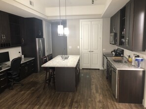 Microwave, dishwasher, cookware/dishes/utensils
