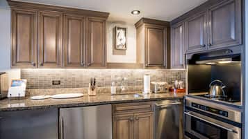 Luxury Villa | Private kitchen | Full-size fridge, microwave, oven, stovetop