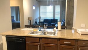 City Apartment, 2 Bedrooms, Non Smoking, Kitchen | Living area | 32-inch flat-screen TV with cable channels, TV -  South River Residences (Denver)