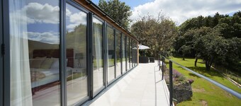 Teign Vale ligger i den rolige Teign-dalen og gjør det meste av sin beliggenhet