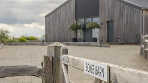 A wooden barn with a sign reading "BOKES BARN" in front of it. - Bokes Barn, Hawkhurst , Kent (Hawkhurst, Cranbrook)