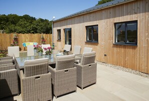 Outdoor dining - A contemporary barn conversion in an Area of Outstanding Natural Beauty. (Hawkhurst, Cranbrook)