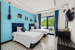 Deluxe Room, Multiple Beds, Garden View | 1 bedroom, minibar, desk, laptop workspace