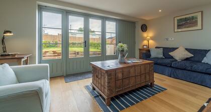 Kitty Coot on rento, tyylikäs mökki upealla merinäköalalla.