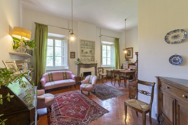 The spacious dining living with fireplace