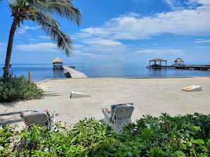 On the beach, sun-loungers, beach towels