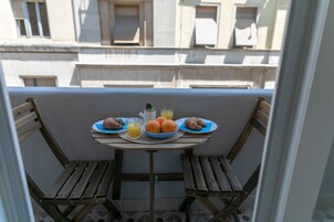 Deluxe-Doppel- oder -Zweibettzimmer, Stadtblick | Balkon
