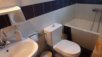 Hair dryer, towels, soap, toilet paper