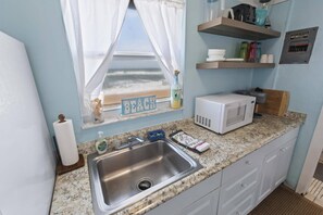 Fridge, microwave, coffee/tea maker, toaster