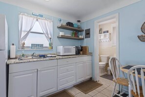 Fridge, microwave, coffee/tea maker, toaster