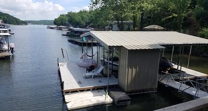 Cute family/ couples cabin with trailer parking and use of our dock in calm cove