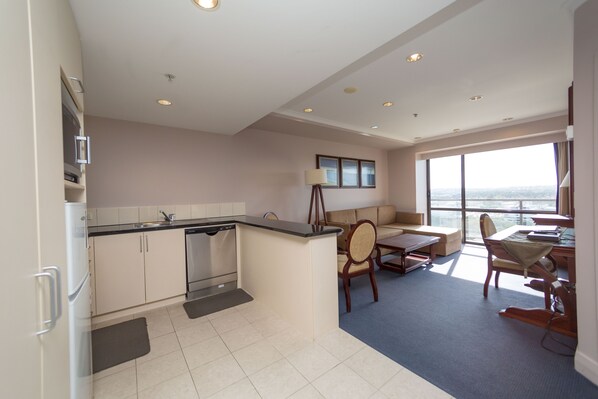 Apartment, 1 Bedroom | Private kitchen | Full-size fridge, microwave, oven, stovetop