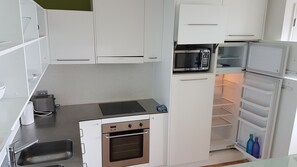 Apartment, 2 Bedrooms | Private kitchen | Full-sized fridge, microwave, oven, stovetop