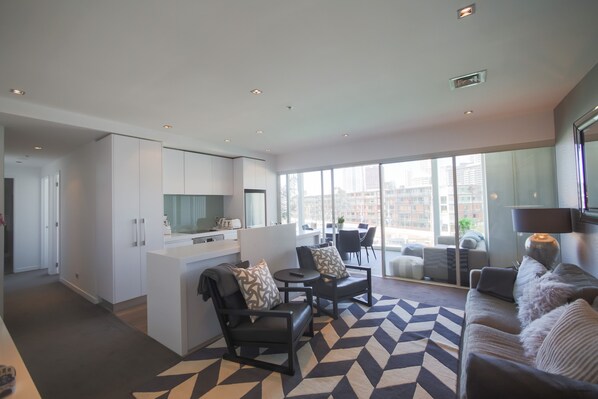 Apartment, 2 Bedrooms | Living area | Flat-screen TV