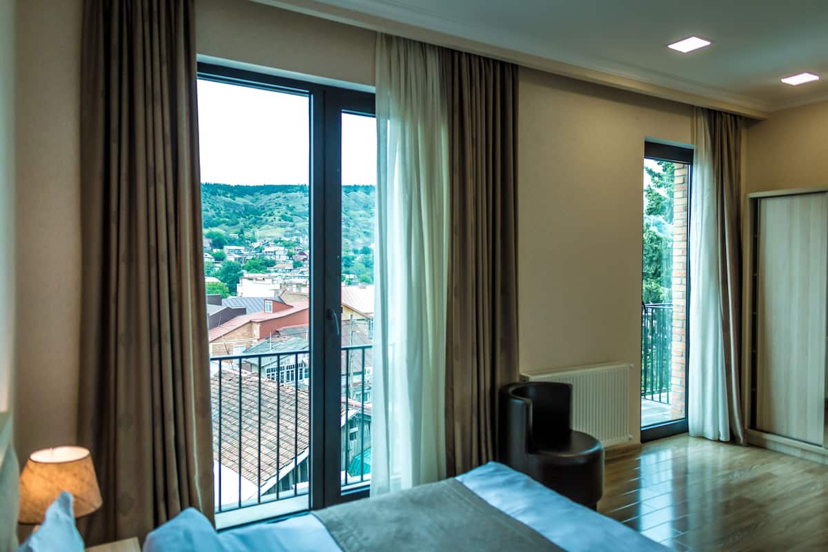 Habitación doble Deluxe | Ropa de cama de alta calidad, camas con efecto memoria y minibar