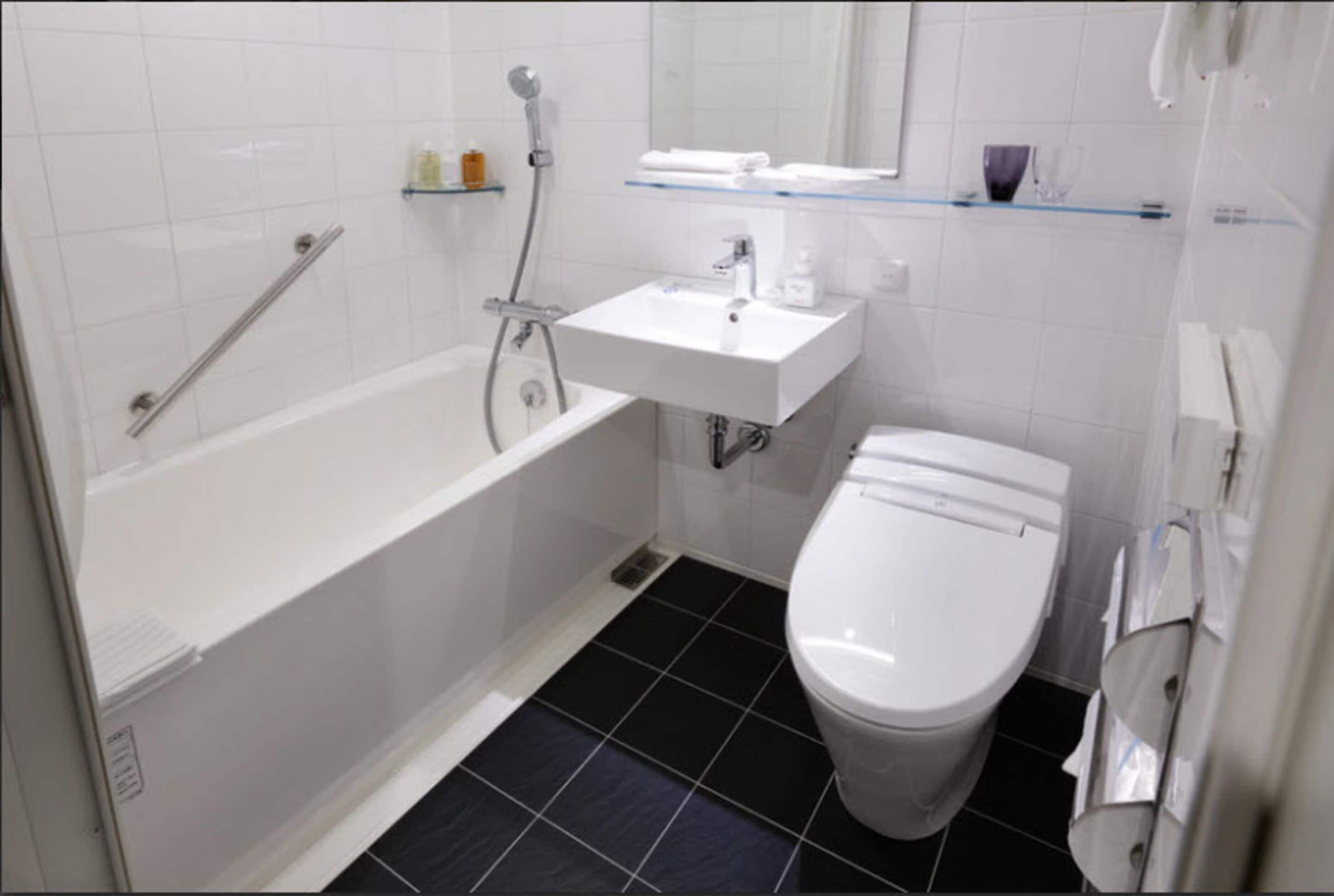 hair dryer, slippers, electronic bidet, towels