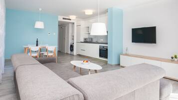 Apartment, 1 Bedroom, Terrace | Living area | 20-inch flat-screen TV with digital channels, TV