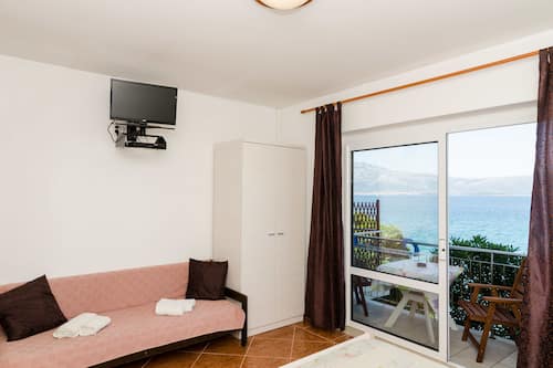 Studio, Balcony, Sea View | Iron/ironing board, free WiFi, bed sheets